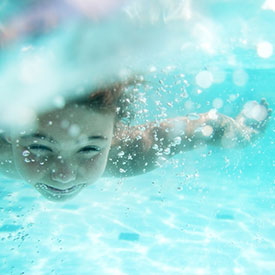 How To Help Your Child Overcome Fear of Swimming